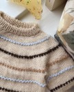 Festival Sweater Baby Oppskrift Petite Knit thumbnail