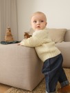 2413-1 Guernsey Sweater baby (oppskrift) thumbnail